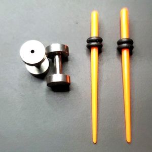 Orange Tapers and stainless plugs 2 pair body piercing 1.6mm = 14 gauge